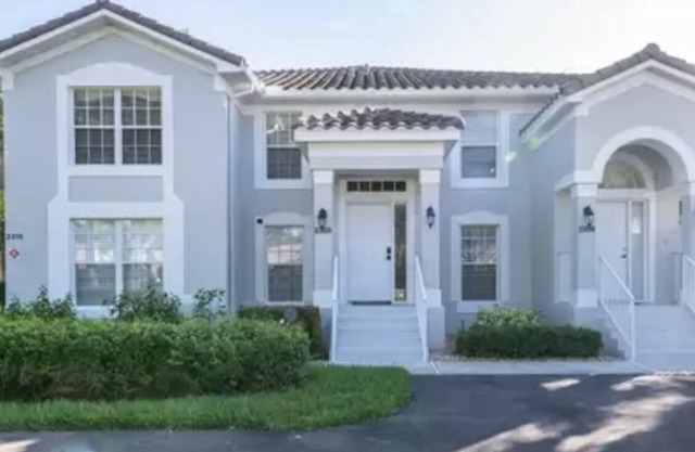 Freshly updated, second floor unit with sunrise view over golf course