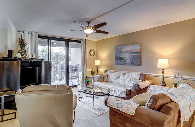 Fun island retreat with pool, hot tub, beach access & balcony