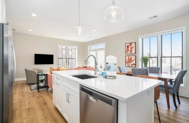 George 203: Multi-Level 8th Street Condo with Private Terrace