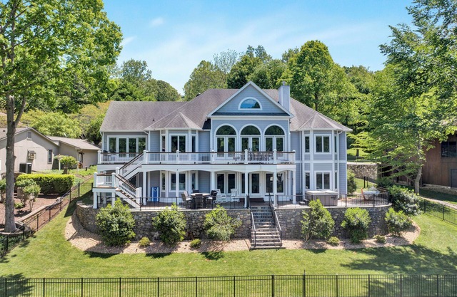 Go Jump In the Lake! Just Listed Custom Lakefront Home with Dock & Amenities!