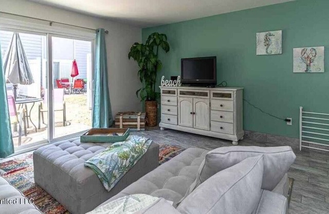 Goin’ Coastal- 2 Bedroom Condo Steps to the Beach!