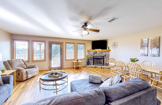 Golf course-front condo with pool, hot tub, dock, tennis, golf, & private beach