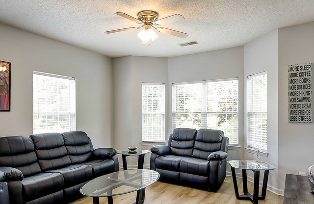 Golf-course-front condo at Legends with pool, tennis court, fireplace, AC & W/D