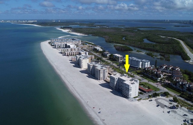 Gorgeous Beachfront With Endless Sunsets! Highly Desired Corner Unit! Heated Pool & Free Parking!