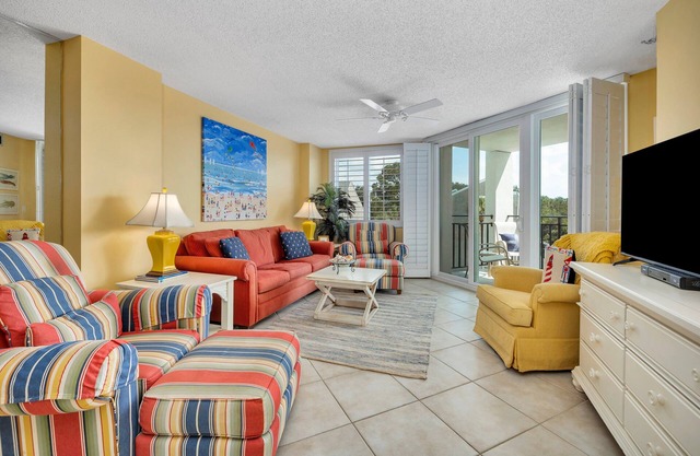 Gorgeous Oceanfront Condominium with Pool. Beach Access with Partial Ocean View