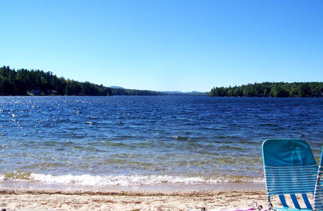 Great East Lake cottage across camp road to a large sandy shared beach. View2NH!