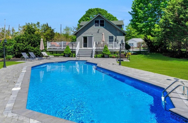 Greenport Village home w/ POOL! Steps to Town Center & Bay Beach!
