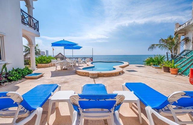 Ground-Floor Beachfront Condo with Pool, Patio & Concierge