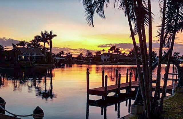 Ground Floor Condo on Beach Parkway-Sailboat Access w/Private Dock and Lift