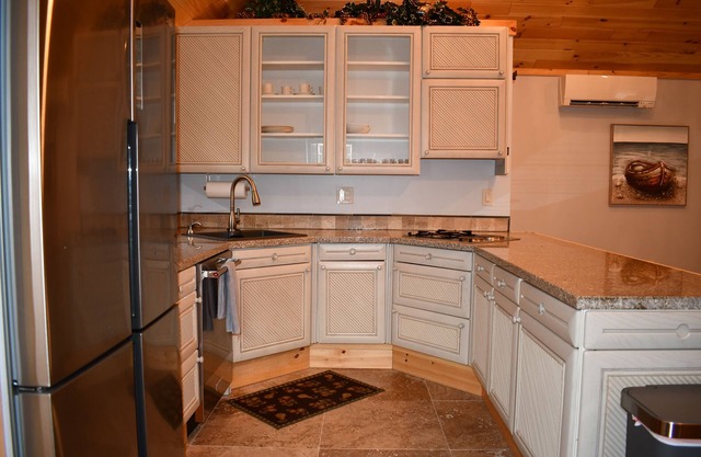 Higgins Lake frontage Small Guest House With Shared Beach, Yard and Dock.