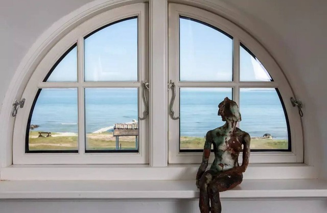 Historical beachhouse with fireplace and view of Sweden