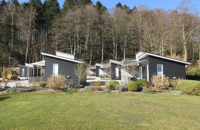 Holiday home with panoramic views of the Limfjord and Legind Mountains.