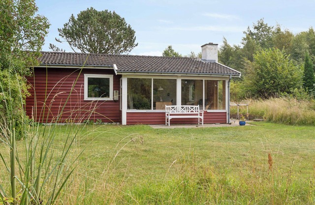 Holiday home with natural plot near beach, hills
