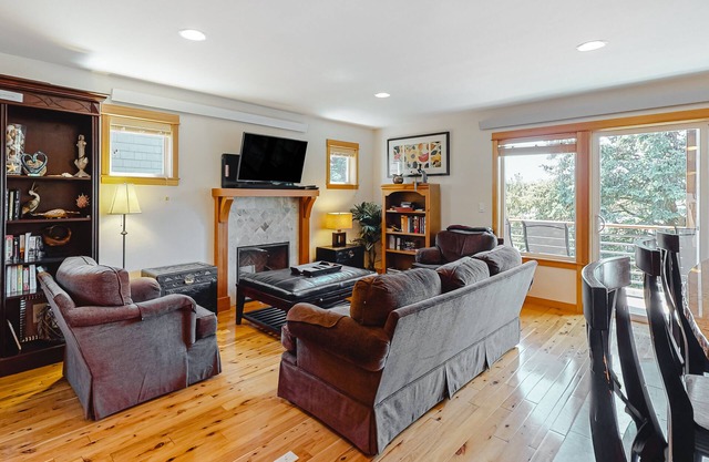 Home with a washer/dryer, fireplace & spacious deck with grill