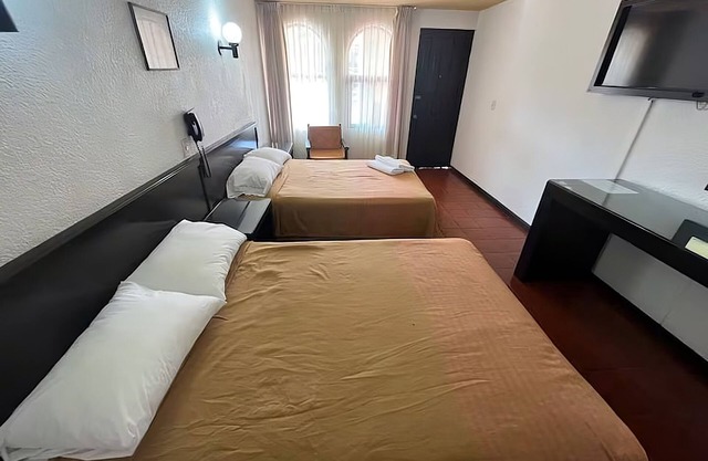 Hotel Villa Capri, 2 camas dobles 4 Huéspedes