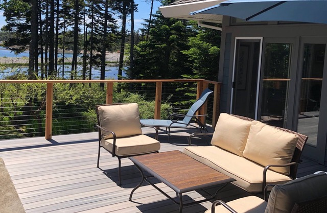 House with Water View and Fireplace on Deck