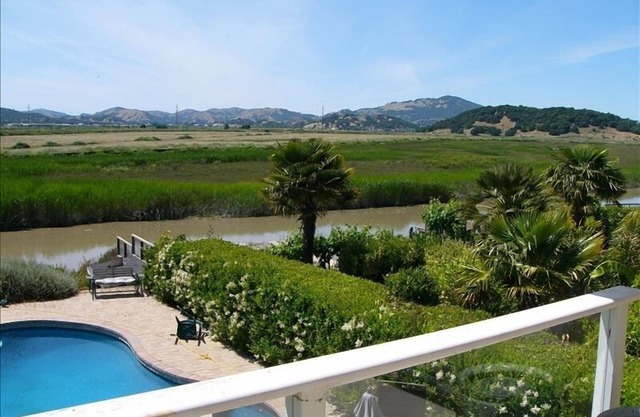 Incredible Waterfront Property, Pool, Boat, Gardens, and More!