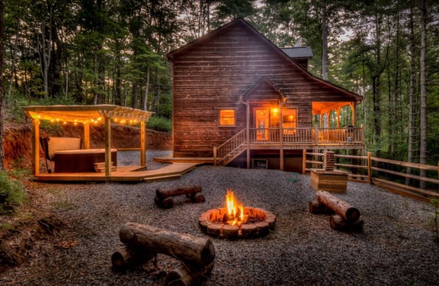 Inviting dog-friendly cabin with hot tub, lovely mountain views, firepit, & W/D