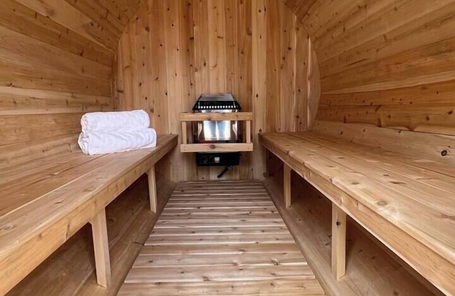 It's Sauna Season! Cozy up in the barrel sauna!