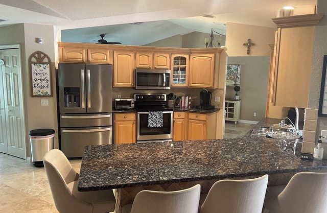 "Joyful Memories" .Beautiful 4/2 Pool Home, Country Setting, Yet Close To All!