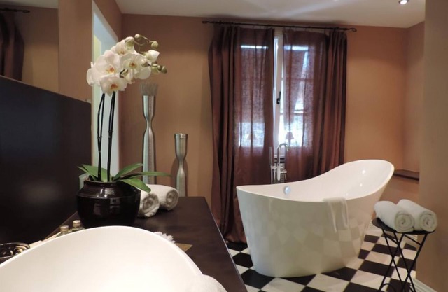 Junior Suite New York with free-standing bathtub and terrace