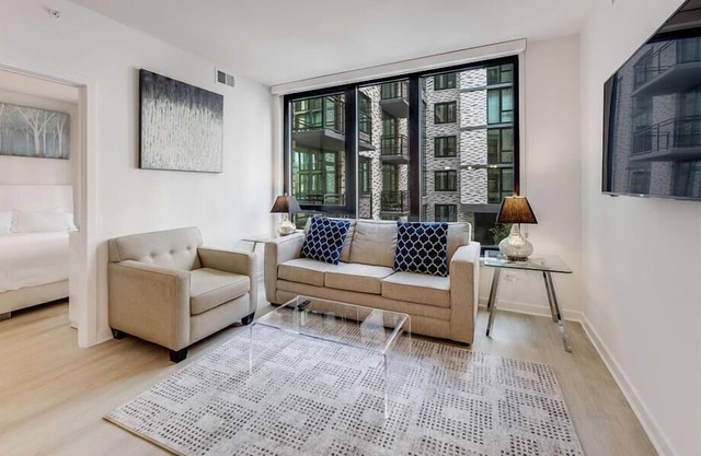 Just mins from Metro RedLine | 2BR w/Desk, TV & Full kItchen