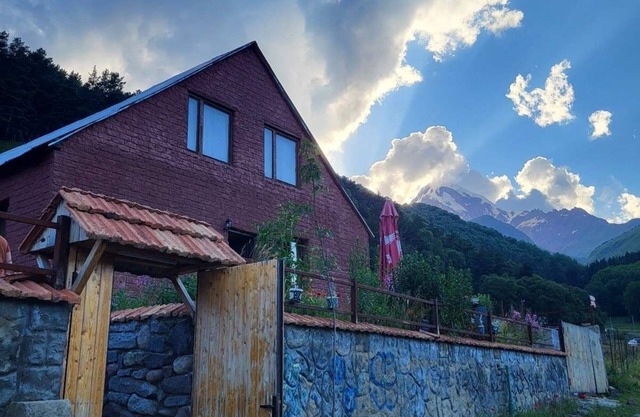 Kazbegi's Peak House: Tranquility and Adventure Await!
