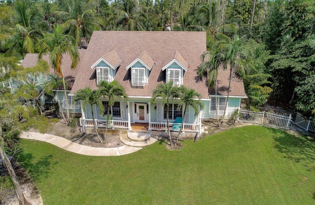Key West Style Luxury Home with resort style heated pool and infinity line spa