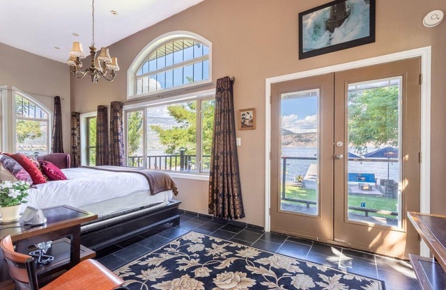 Lake Front Downtown Kelowna home With beautiful dock