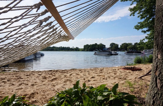 Lake house with private sandy beach on Hutchins Lake!