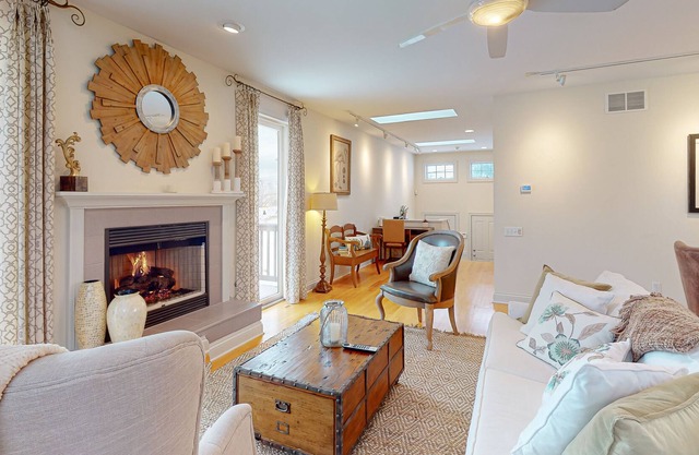 Lake-view home one block from the beach with deck, patio, & washer/dryer