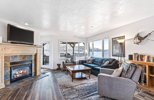 Lakefront Condo w/Stunning Views, Balcony, & Fireplace