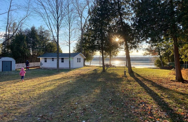 Lakefront Cottage Retreat w/Private Dock, Paddle Boards, Fire Pit, Sunset Views