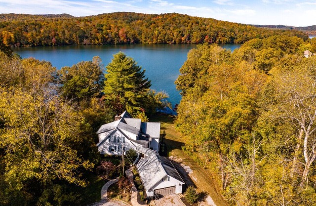 Lakefront Haven with Modern Amenities, Fire Pit, and Stunning Views