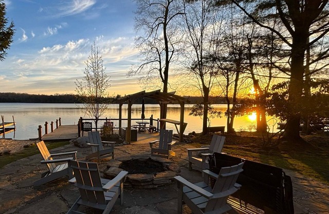 Lakefront home offering private dock, beach, fishing and kayaks for activities.