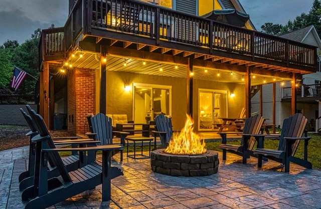 Lakefront home with brand-new hot tub, dock, kayaks, SUP, game room & firepit