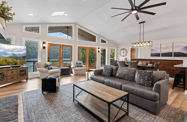 Lakefront home with private hot tub, dock, golf, pool, pickleball, firepit, AC