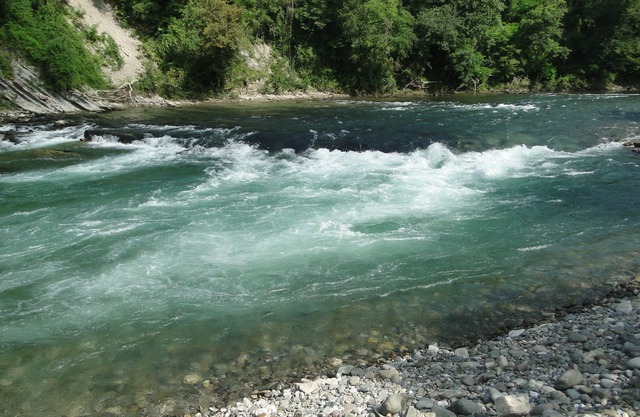 Large detached house on river bank with beach. Swimming pool.