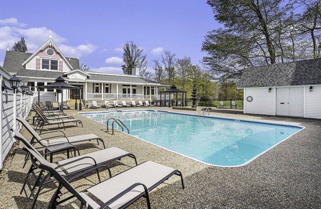 Large family friendly compound, heated pool, and Indoor Basketball court