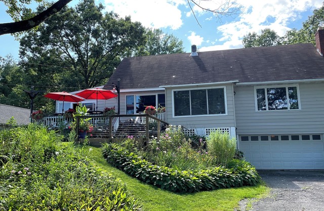 Large Saratoga Lake House, close to all amenities , privacy of lake living.