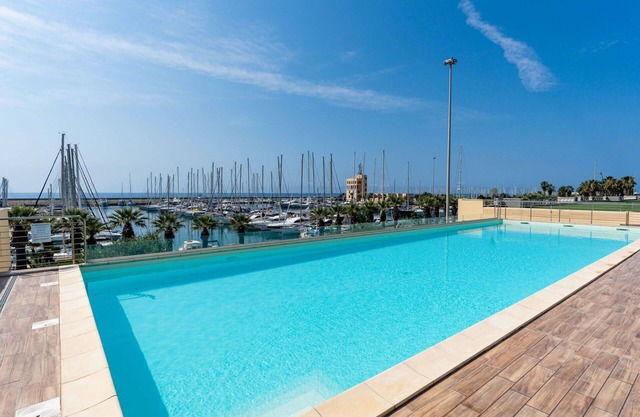 Lovely apartment for 4 people with A/C, WIFI, pool, TV and terrace