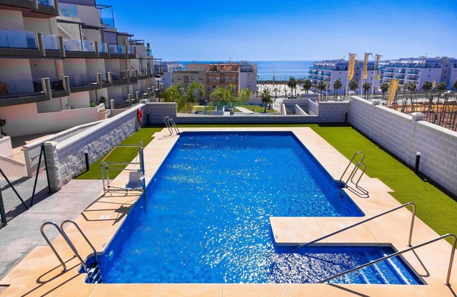Lovely apartment for 4 guests with pool, WIFI, A/C, TV, patio and parking
