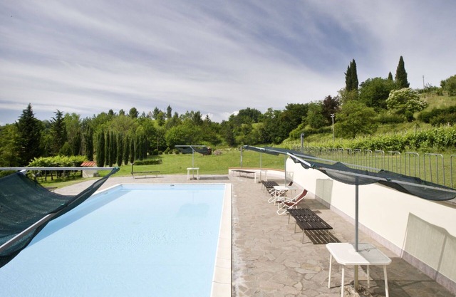 Lovely apartment for 5 people with WIFI, pool, pets allowed, panoramic view and parking