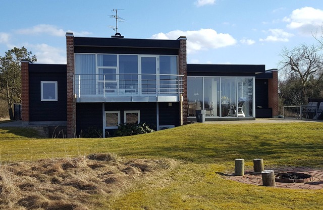 Lovely holiday house located at the 1st row close to the beach. Free Wi-fi.