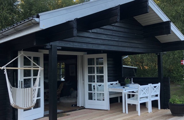Lovely log house next to protected plantation