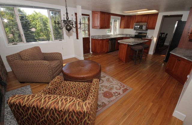 Lovely sunlit ranch style home with large fenced yard