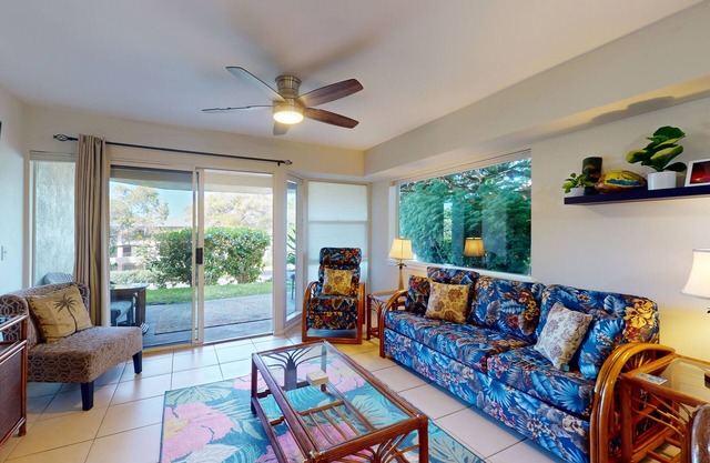 Lush tropic stay with a lanai, washer/dryer, shared pool, hot tub, & game room