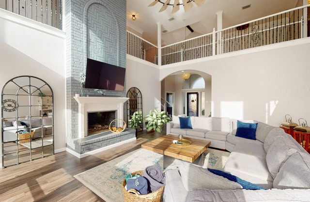 Luxe, lakefront home with amazing private pool with fountain & home office
