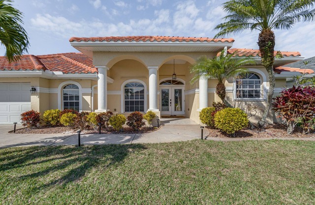 Luxe Waterfront Oasis w/Dock, Heated Pool & Spa!