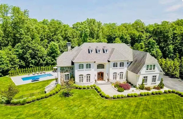 Luxurious 7-Bedroom Katonah Estate with Pool & Scenic Lake Views.